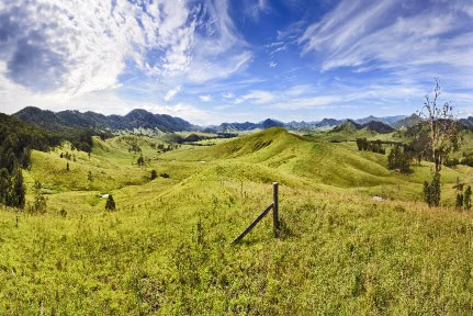 Australian rural agricultural area developed for cattle production - view over green grazed hills in cobark valley, NSW