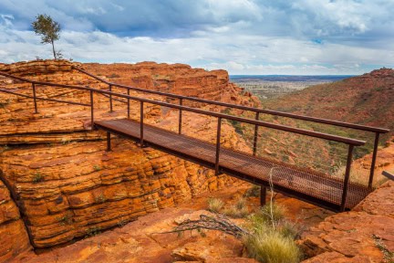 Cotteril's Bridge crosses a deep crevice providing access to spectacular views from the north wall, Kings Canyon, Northern Territory, Australia