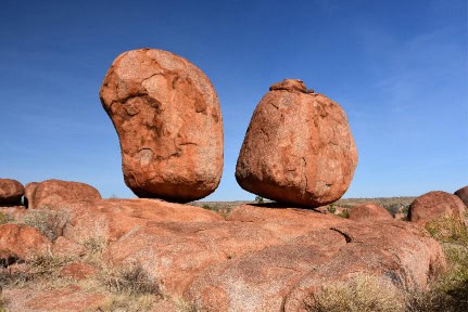 Massive boulders formed by erosion in the Karlu Karlu, Devils Marbles area of the Outback (Northern Territory, Australia)