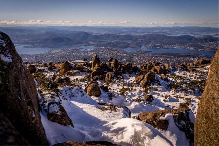 Snow in winter on top of Mt. Wellington with view on Hobart, Tasmania, Australia